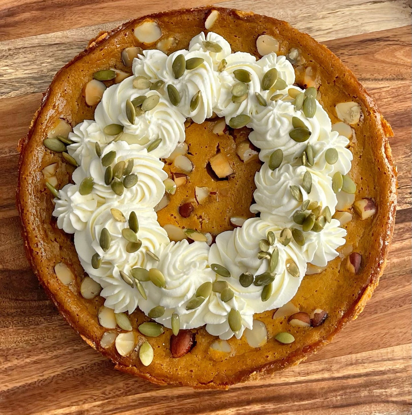 Seasonal Pumpkin with cookie crust & nuts Pie